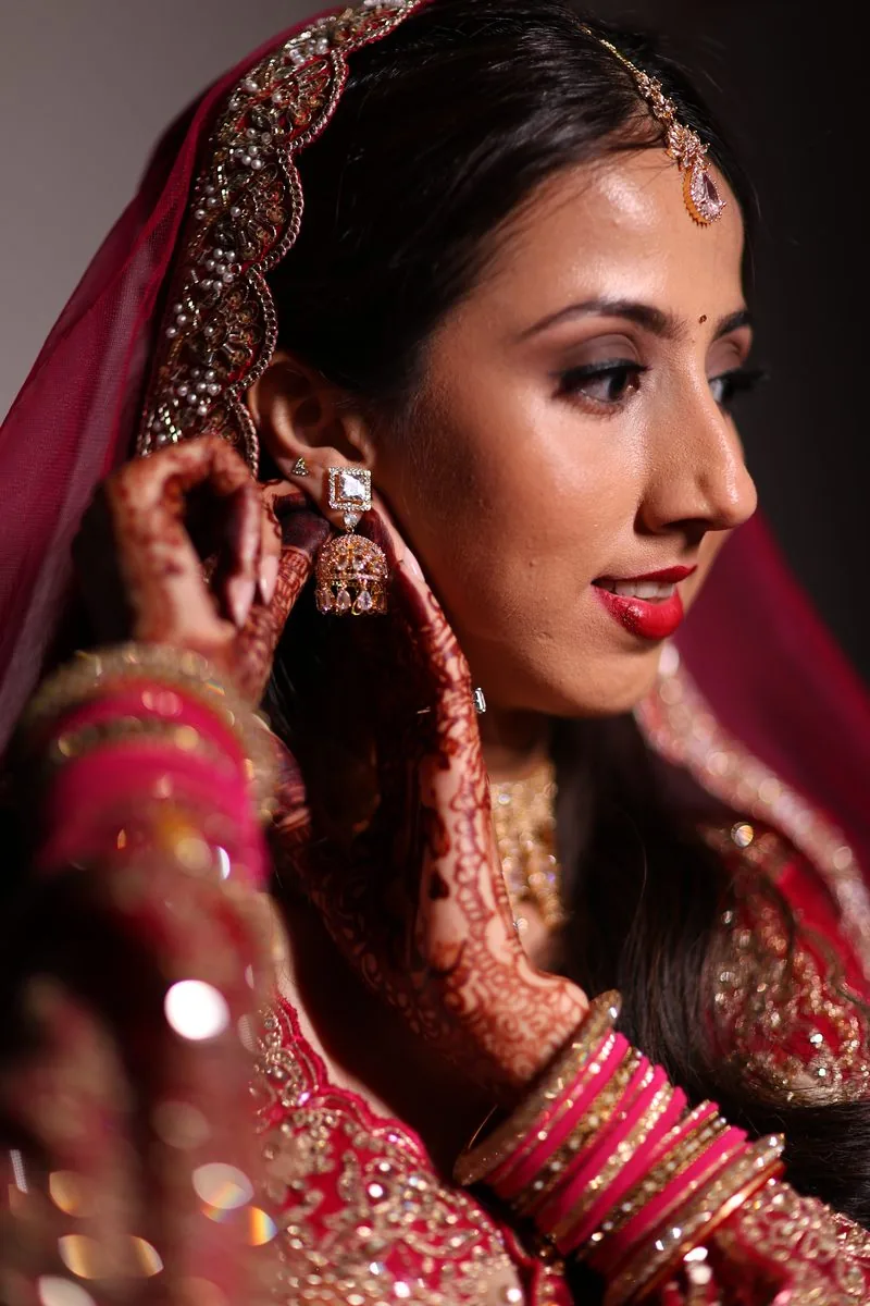 The milni, two families meeting with garlands after the baraat