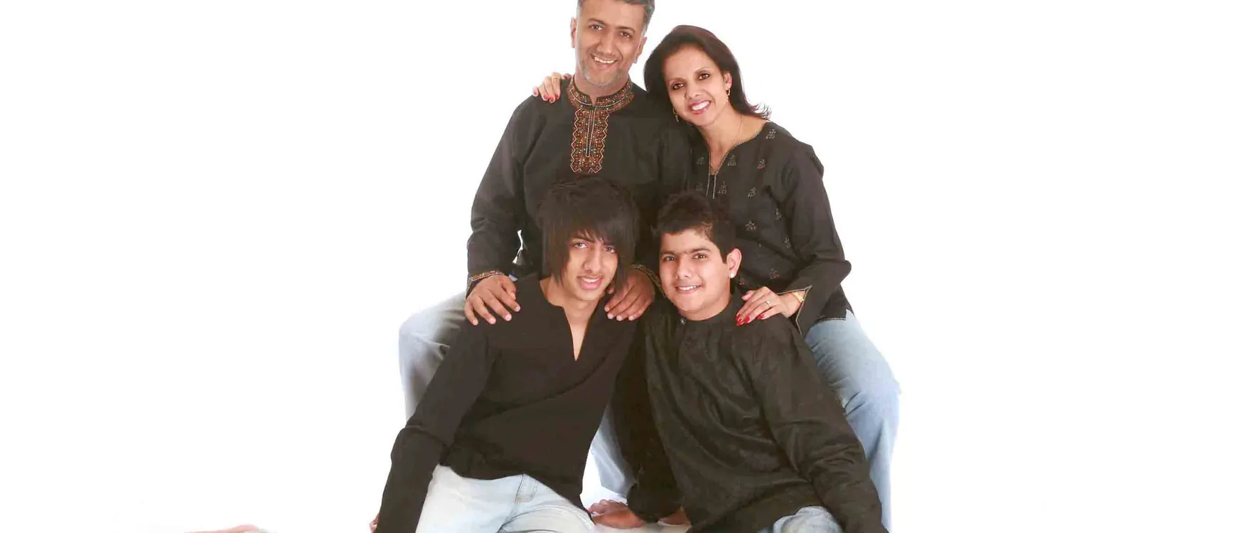 Coordinated family dressed for a photoshoot