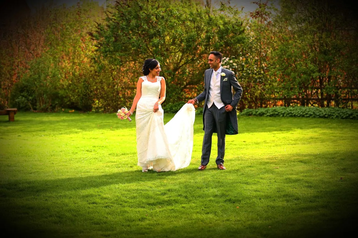 Couple in a tree-lined park during a pre-wedding shoot